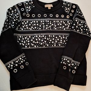 Sweater. Very modern!